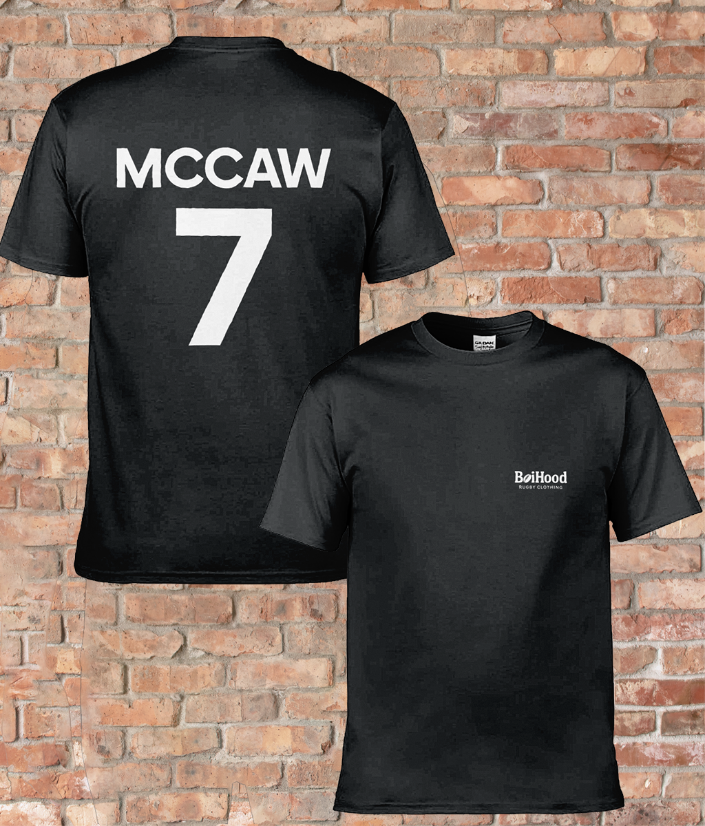 BoiHood Adult Unisex T-Shirt featuring McCaw #7, black jersey on a brick background, perfect for rugby fans.