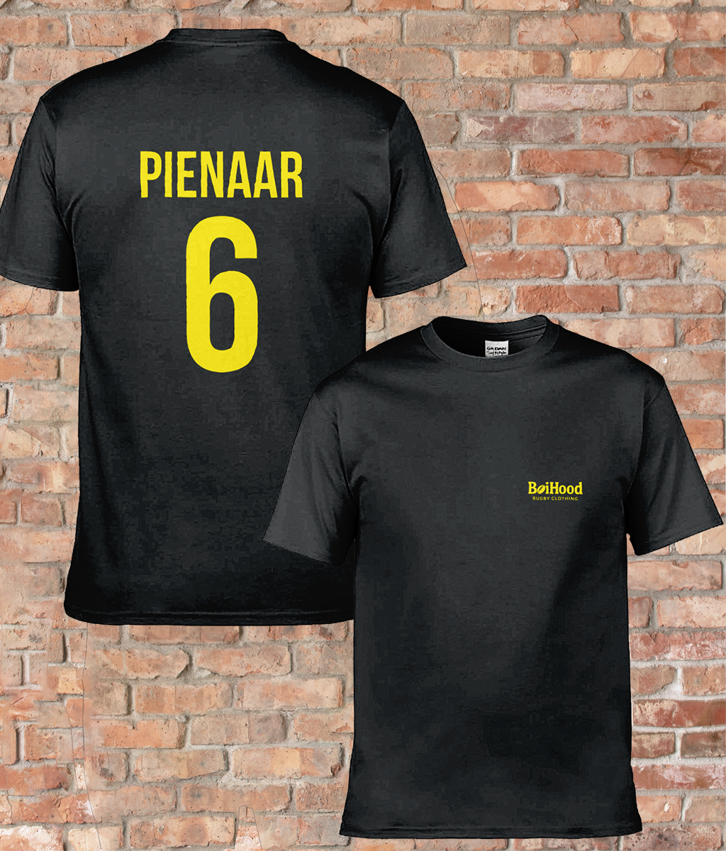 BoiHood black unisex T-shirt featuring 'Pienaar 6' print on the back against a brick wall.